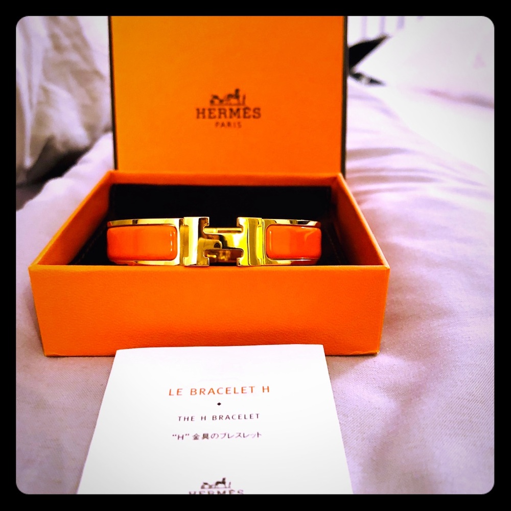 Authentic orange and white enamel Hermes clic clac